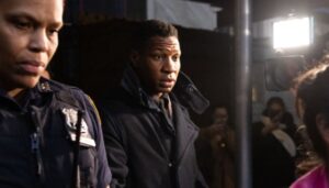 Jonathan Majors & His Flared Jeans Sat Down For An Interview With ‘ABC News Live,’ X Users Are Ready For The Mess