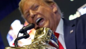 Donald Trump Booed At Sneaker Con While Selling Sneakers, X Clowns His Gold MAGA Fraud 1âs
