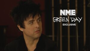Green Dayâs Billie Joe Armstrong holds up “idiot” Donald Trump mask at ‘Saviors’ show