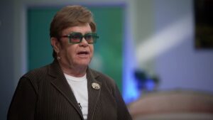 Elton John says he was “just a void” after changing his name