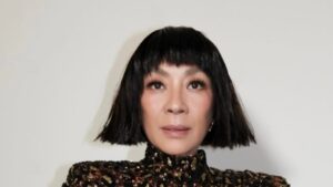 Michelle Yeohâs Hairstylist Renato Campora Shares Why the Actress Likes 'Playing With Different Looksâ