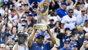 Ice Cube Presents L.A. Dodgers With World Series Trophy Via Lowrider